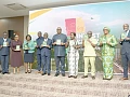Elizabeth Ofosu-Adjare (5th from right), Minister of Trade, Agribusiness and Industry, being assisted by Simon Madjie (middle), CEO, GIPA; Dr Mary Awusi (3rd from right), CEO, Ghana Free Zones Authority; Francis Kojo Kwarteng Arthur (4th from right), CEO, Ghana Export Promotion Authority, and other officials to launch the 2026 Invest Ghana Summit and Ghana Club 100 Awards
