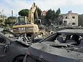 One of the overnight strikes in Kfar Remman destroyed a three-storey residential building