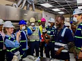 Edmond Kombat (4th from right), Managing Director,  TOR, with some staff and members of the IMF team