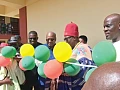 President John Mahama being supported by Pe Gideon Awolugu (2nd from right), Chief of Nakolo, and Nikyema Billa Alamzy (2nd from left), MP, Chiana-Paga Constituency, to cut the ribbon while Haruna Iddrisu (right), Minister of Education, looks on