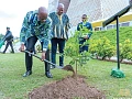President Brice Clotaire Oligui Nguema planting  a tree at the Jubilee House while President John Mahama looks on