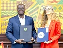Dr Cassiel Ato Forson (left), Minister of Finance, and Carole van Eyll, Ambassador of Belgium, displaying the agreement