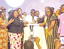 Albert Kwabena Dwumfour (middle), President of the GJA, assisted by Rebecca Ekpe (4th from left), Vice President of the GJA, and other officials in cutting the cake. Picture: CALEB VANDERPUYE