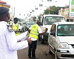 File photo: Some policemen and road safety officials on road checks