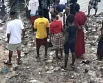 People watched on anxiously as locals organise a rescue effort