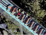 Aerial footage shows riders stuck on Six Flags roller coaster