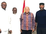 Kofi Adams (left), Minister of Sports and Recreation, with the leadership of the IMC