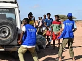 IOM workers receiving migrants near Guhere, north of the port town of Obock