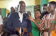 Haruna Iddrisu, Minister of Education, addressing some students during his visit to the Western Region