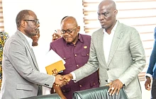 Haruna Iddrisu (right), Minister of Education, in a handshake with Prof. Ernest Kofi Davies (left), Director General, Ghana Education Service, after the meeting with the three-teacher unions. With them is Dr George Smith-Graham (middle), Chief Executive Officer, Fair Wages and Salaries Commission