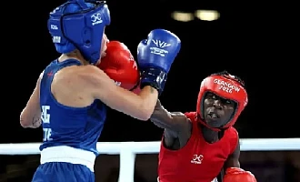 Angel Katushabe (red) competed in the recent Games in Glasgow