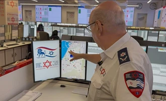 Chaim Rafalowski, Coordinator of International Cooperation at Magen David Adom, explaining how the ambulance service works in Israel