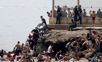 Spainish enclave Ceuta raises alarm as thousands cross border from Morocco