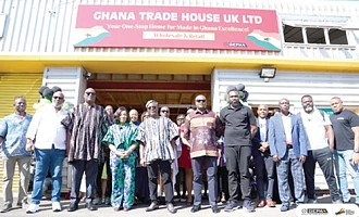 Officials in front of the Trade Hub