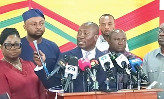 Alexander Afenyo-Markin (3rd from right), Minority Leader,  showing a copy of the IMF report that revealed that the GoldBod lost GH¢22 billion in gold trade in 2025. With him are members of the Caucus,  including Patricia Appiagyei (left), the Deputy Minority Leader