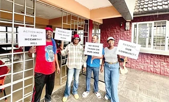 Some of the residents displaying placards during the demonstration