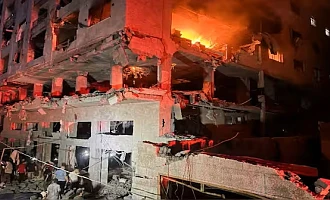 A fire erupts in a residential apartment after Israeli shelling, according to the Ministry of Health, in Gaza City on Friday. Reuters