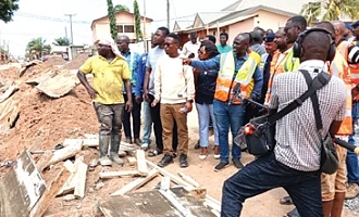 Dr Ernest Henry Norgbey, MP for Ashaiman; Freeman Tsekpo, MCE for Ashaiman, and other stakeholders inspecting ongoing road and drainage projects in the municipality