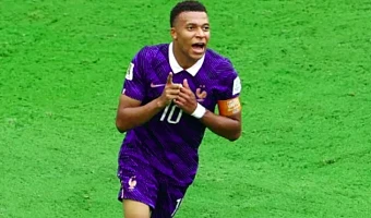 Kylian Mbappe celebrates scoring his second and France's third goal