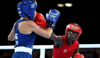 Angel Katushabe (red) competed in the recent Games in Glasgow