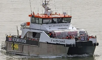 Border Force pictured escorting migrants to the UK after being rescued in the Channel in March