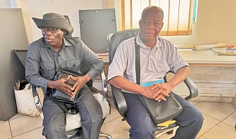 Mr Justice Kojo Tsekpo (right), leader and spokesperson for the Concerned Citizens of Maamobi No. 2 Market, with Mr Emmanuel, during an interview with  Graphic Online