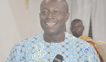 Maxwell Oduro Yeboah (right), National President of the Union of Professional Nurses and Midwives, addressing the conference