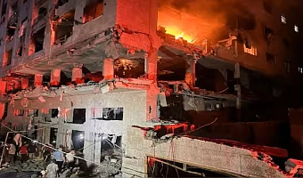 A fire erupts in a residential apartment after Israeli shelling, according to the Ministry of Health, in Gaza City on Friday. Reuters