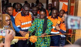 AngloGold Ashanti Iduapriem Mine Managing Director, Mr Daniel Boadi (left), and the Pro-Vice-Chancellor of the University of Mines and Technology (UMaT), Professor Grace Ofori-Sarpong Akuffo, cut the ceremonial tape to officially commission the AngloGold Ashanti Iduapriem Smart Systems Centre