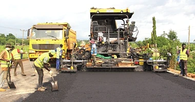 Workers of China Jiangxi Engineering Ghana Limited working on a section of the Nkwanta-Oti Damango section of the upgrading of the Eastern Corridor Road