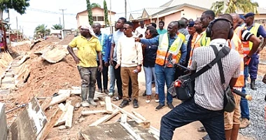 Dr Ernest Henry Norgbey, MP for Ashaiman; Freeman Tsekpo, MCE for Ashaiman, and other stakeholders inspecting ongoing road and drainage projects in the municipality